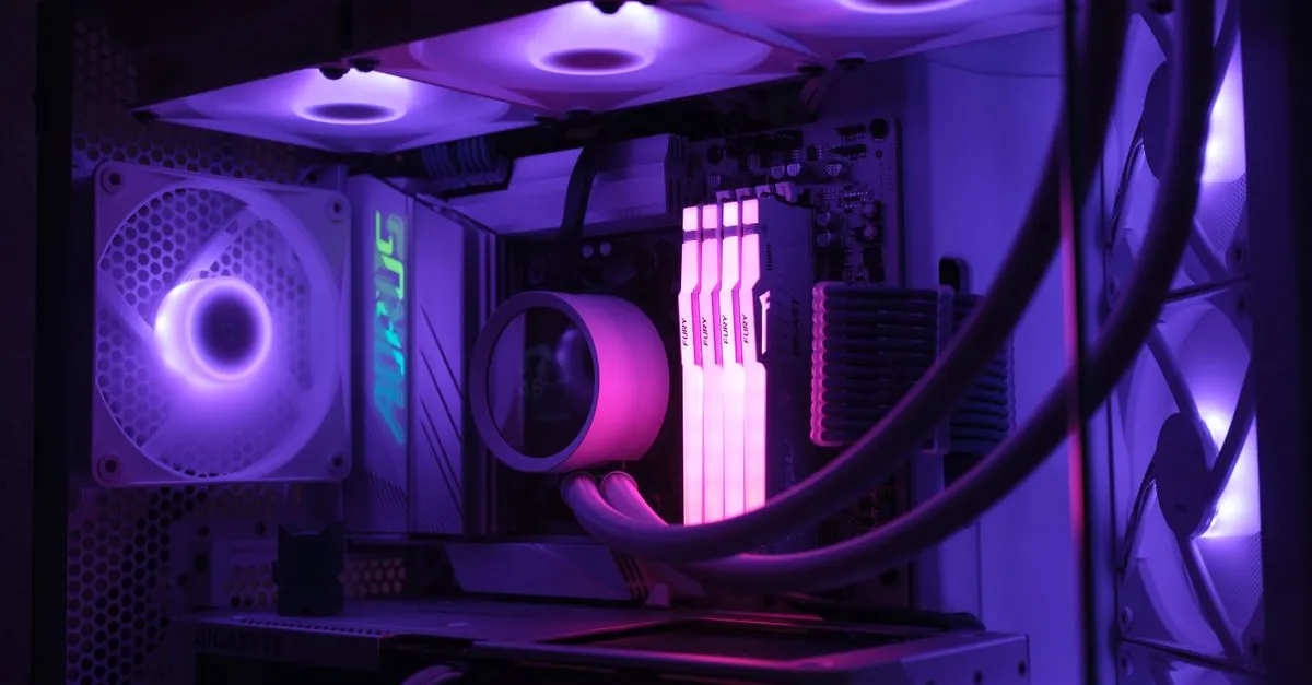 Close-up of a gaming PC showcasing vibrant RGB lighting and cooling system for high performance.